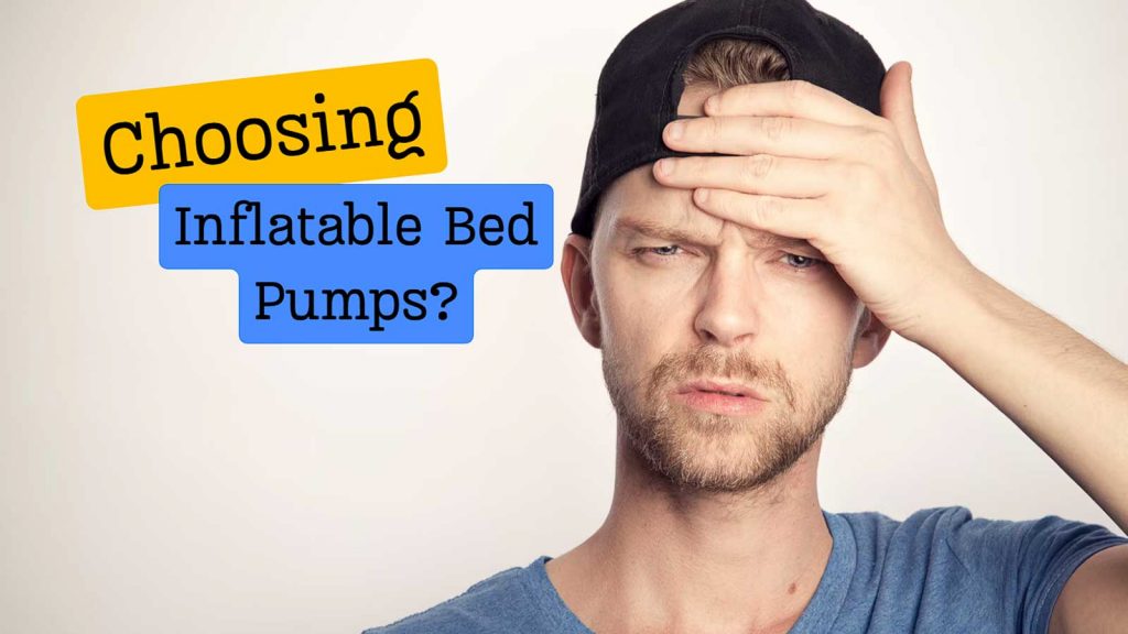 Man Choosing Inflatable Bed Pumps